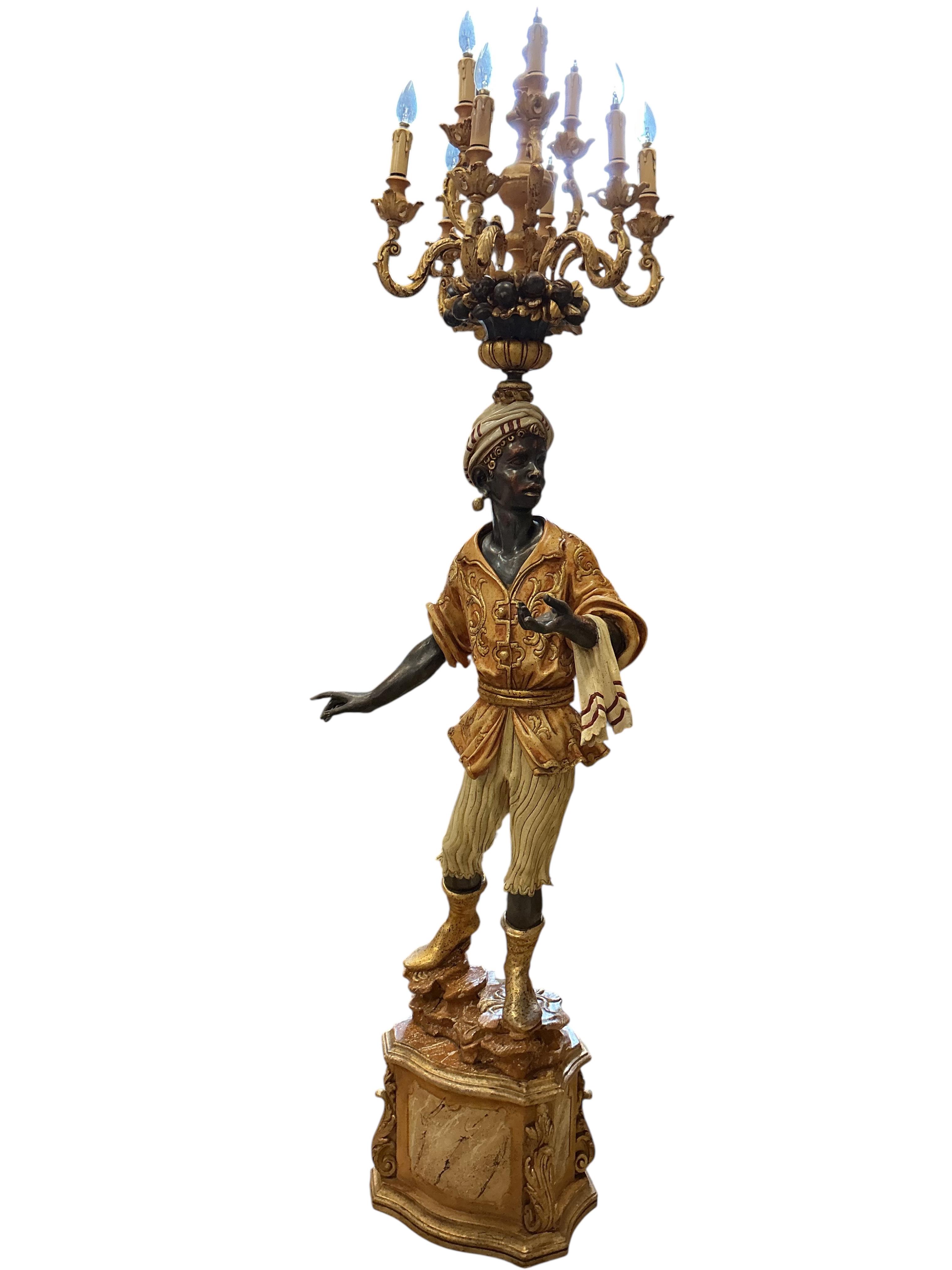 A pair of Venetian style Blackamoor floor lamps, height 218cm